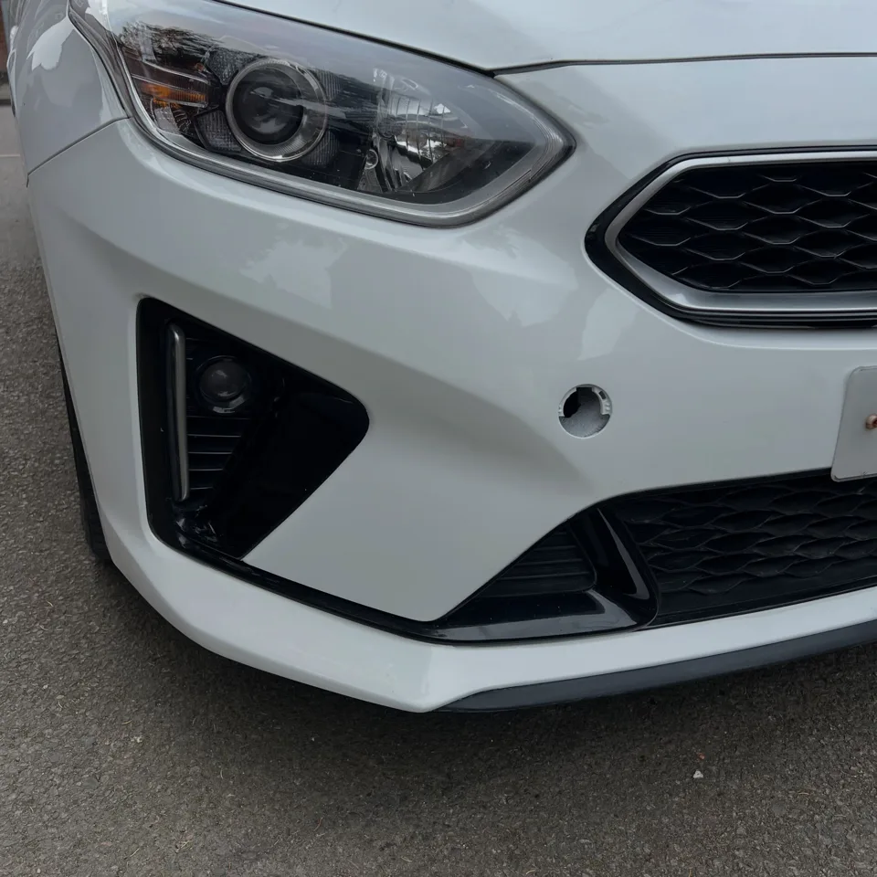 White front bumper after cosmetic repair